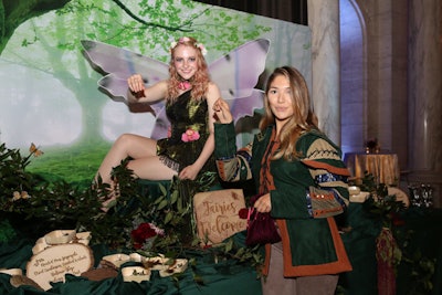 An actress dressed as a fairy provided guests with another photo op, complete with a wooden sign that read 'Fairies Welcome.'