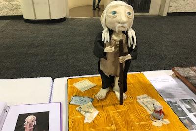 This sculpted cake was inspired by the character Dobby from the Harry Potter series.