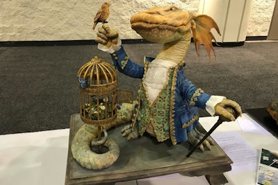 This competitor in the sculpted category created a cake replica of a painting she loves, “The Dragon and the Nightingale” by Omar Rayyan, using modeling chocolate, fondant, gumpaste, pastillage, wafer paper, and hand-sculpted clay molds.