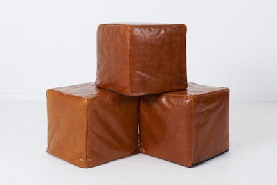 Leather cube ottoman, $50, available nationwide from Patina Rentals