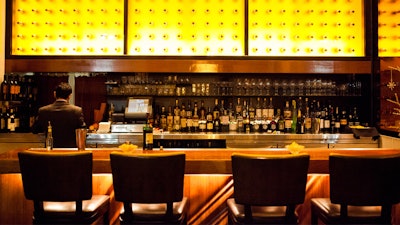Patina Restaurant; Cozy, illuminated bar.