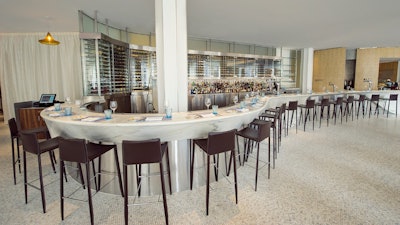 Stella 34 Trattoria, on 6th floor of Macy's Herald Square; Serpentine Bar extends from entrance alongside the dining room.
