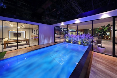 For the 23rd edition of gaming expo E3 in Los Angeles in June, Event Eleven designed a mid-century modern home for software company Take-Two Interactive—all on the trade show floor. The 8,000-square-foot space featured a pool, an exterior deck, a service kitchen, and a game room. Bedrooms, a living room, a lounge, and a dining room served as meeting spaces.