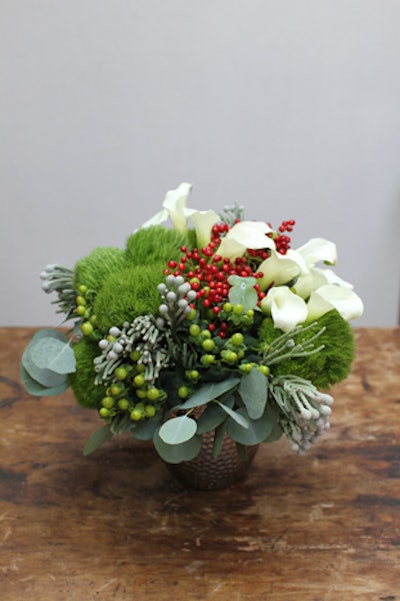 Matthew Schechter of Interior Foliage Design in New York predicts that floral elements like cymbidiums, dianthus, and hypericum berries will continue to be popular for arrangements.