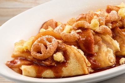 Burrell's apple and cheese crepes include two varieties of Cheetos Sweetos, Caramel and Cinnamon Sugar Puffs, along with Cheetos Puffs White Cheddar Cheese Snacks and tart Granny Smith apples. Adding depth to the dish, the crepe recipe includes brandy.