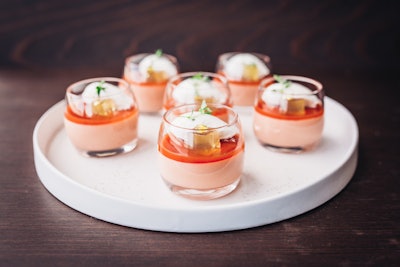 Also on Wolfgang Puck Catering’s holiday menu is the Blood Orange Panna Cotta, a dessert featuring candied ginger, Grand Marnier orange zest, and sugared Thai basil.