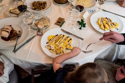 The kids’ menu included a mixed fruit salad, turkey with cranberry jus, spaghetti pomodoro, and tortelli, and mini desserts like cookies, nocciole mousse, and gelato.