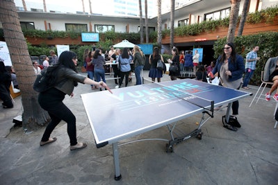In the lounge, guests could unwind by playing ping-pong on a table imprinted with the festival logo.