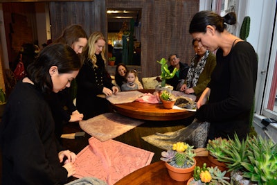 Sara Harari-Buchnea of Squar’d Away led a bandana-tying and -styling tutorial for attendees.