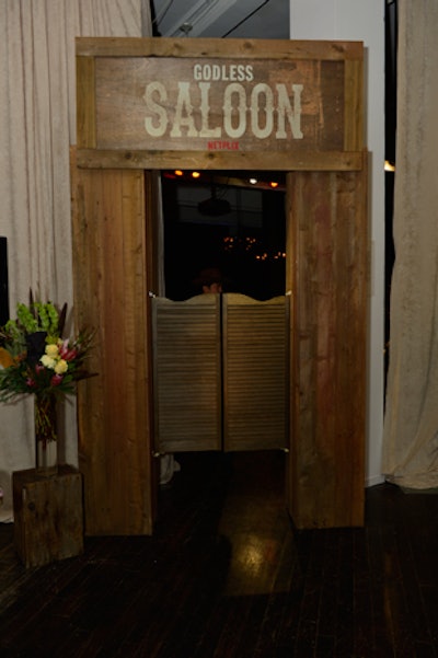 A saloon-inspired doorway invited guests to a separate lounge and bar area called the 'Godless Saloon.'