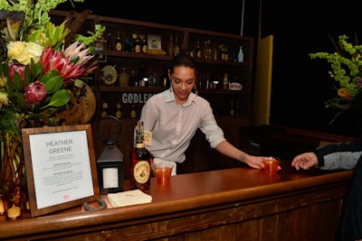 Whiskey sommelier Heather Greene served cocktails from a branded bar. Greene also taught guests about the history of women and whiskey, and led a Michter's whiskey tasting.