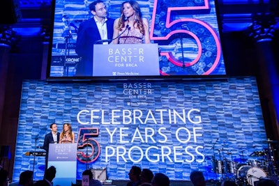 The benefit, which took place November 14 at Cipriani Wall Street, showcased a massive wall of folded jeans that served as the stage backdrop. The jeans, which were donated from Cotton Incorporated's Blue Jeans Go Green program, also were folded inside a red number 5, in celebration of the Basser Center's fifth anniversary.