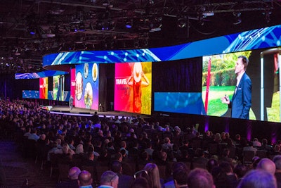 The general session stage was backed by 460 linear feet of screens using 2,050 panoramic LED panels.