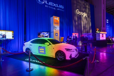 One guest won a 2018 Lexus RC 350 F Sport in a raffle, and the reception's Lexus activation included a car bathed in color-changing neon lights.