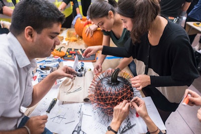 The Pritzkerpumpkin was awarded to LOT-EK for its black pumpkin with geometric nail grid.