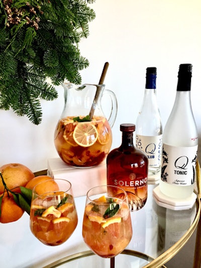 Sangria isn’t just for summer. The Winter Citrus Sangria features Q Club Soda, Q Tonic, Solerno Blood Orange Liqueur, Cocci Americano Italian White Vermouth, and white wine. Add some sliced winter citrus—think pink grapefruit, mandarin oranges, and lemon—garnish with a sprig of mint.