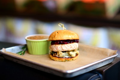 Austin-based eatery Hopdoddy Burger Bar is offering a new Thanksgiving special called the Turducken Burger. The burger includes a stuffing bun, fried green beans and onions, cranberry sauce, salt and pepper, mayonnaise, and a turducken patty. Turkey gravy is served on the side. The $10 burger is available at all Hopdoddy locations in Texas, Arizona, Colorado, and California until November 22.