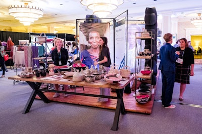 Each booth was framed by a backdrop showing a photo and quote from one of the artisans.