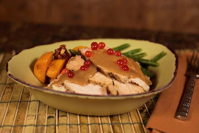 At Disney’s Animal Kingdom in Orlando, Satu’li Canteen is serving its own version of a traditional Thanksgiving meal. The dish features wood-grilled roasted turkey breast with gravy, apple and sage stuffing, green beans, orange marmalade glazed sweet potatoes with candied pecans, mashed potatoes, and cranberry boba pearls; it is available in both adult and kid-size portions.