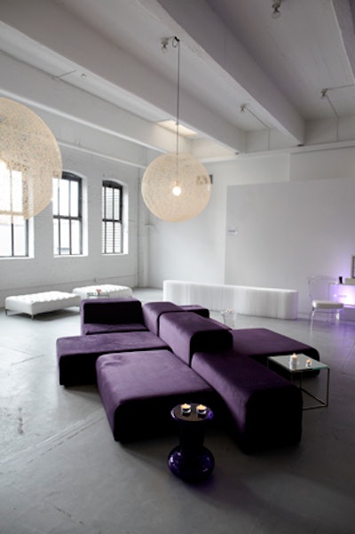 These lush plum modular velvet ottomans from Taylor Creative can be rented a la carte or in pre-set configurations. Pricing ranges from $115 to $250 per piece or $1,500 for the configuration shown. The Lounge Modular collection is available for rent in New York and is also available in millennial pink, white, gray, denim, and black. Also pictured is the Boheme stool in violet ($60).