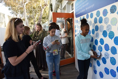 Sponsor Facebook Messenger created a wall where attendees could 'send a message that matters' by leaving notes of encouragement and love.