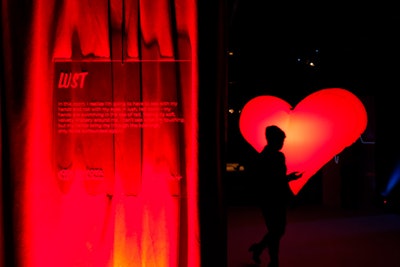 The 'Lust' space provided a photo op with velvet drapery that was suspended at multiple anchor points and angles. Maitland explained that the popularity of red vehicles inspired the color scheme.