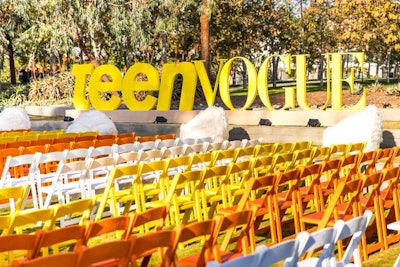 The overall event, which was held mostly outdoors at the 72andSunny campus in Playa Vista, had a white, yellow, and orange color scheme, creating a clean, sunny vibe. In the main-stage seating area, fuzzy bean-bag chairs were scattered throughout, and a larger-than-life Teen Vogue sign provided a popular photo op. Most furniture rentals were provided by PBteen, and supplemental rentals were by AFR Event Furnishings and Town & Country Event Rentals.