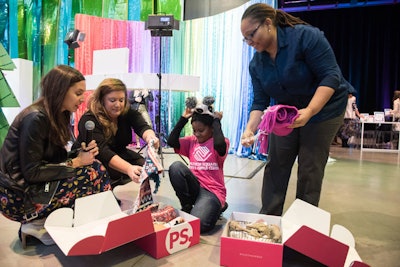 The event had a charitable component: For every gift box made during the V.I.P. preview hour, one box was to be donated to Boys & Girls Clubs of America for kids to give to their mothers or other loved ones. One member of a Manhattan branch was on hand with her mother and received boxes to take home.