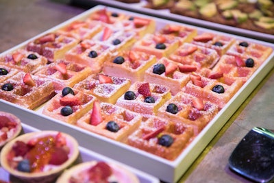 Catering from Food in Motion included breakfast foods like mini Belgian waffles with fresh fruit, avocado toast, and pomegranate smoothies.