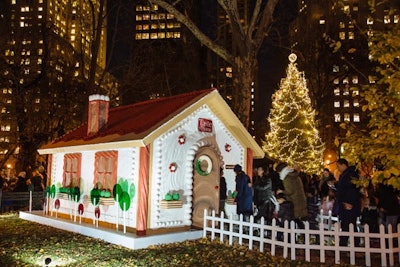 The centerpiece of Taste of Home’s Gingerbread Boulevard in Madison Square Park is an interactive 12- by 16-foot gingerbread-style house.
