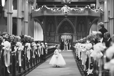 The flower girl enjoying her moment at a New Year's wedding