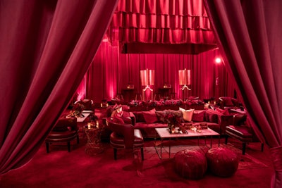 While Valentine's Day events typically take on a red or pink color scheme, it can still feel unexpected. At Netflix's Golden Globes party in January, the brand worked with Swisher Productions to produce an elegant bash with an all-red color scheme. The dramatic decor extended to a wall of roses situated above the bar.