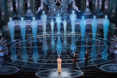 For the 89th annual Academy Awards, held in Los Angeles in February 2017, returning sponsor Swarovski partnered with production designer Derek McLane to illuminate the stage. The design—the brand's 10th collaboration with the show—featured more than 300,000 crystals, the largest number ever used for the ceremony. Eleven Oscar-shaped figures featuring nearly 150,000 crystals served as a focal point.