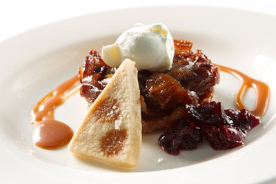 Caramel apple-cherry tart paired with salted caramel shortbread, dried cherries, and a salted caramel drizzle, by D’Amico Catering in Minneapolis