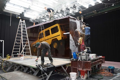 The idea and conception of the campaign is from the Mercedes-Benz creative agency Antoni. Featuring a 44.4 ton block of amber-colored synthetic resin, the production of the 8- by 10.2- x 8.4-foot cube was carried out by Markenfilm Crossing and required a 90-day build. Every day the block grew by around 1.2 inches in height. Following the Detroit car show the cuboid will be placed on display in select markets in tandem with the new G-Class market launch.