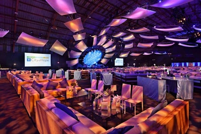City of Hope, a nonprofit cancer treatment and research center, held its Spirit of Life award gala in November in Los Angeles. The event, which was produced and designed by Namevents, had a sunset beach theme with blue, yellow, and pink tones. Rising from the stage was a series of oversize panels hung from the ceiling, creating the overall effect of a setting sun.