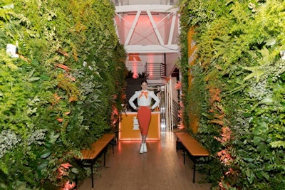 Inside, the space was designed to evoke a stylish dermatologist's office. At the entrance, an actress played the part of a receptionist, and a lush wall of greenery by Raven Hollow Guild created a hallway. One the wall was the phrase 'The Doctor Will C You Now,' nodding to the event's vitamin C theme.