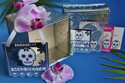 After the party, guests received a “Revival Kit” as a turndown gift. The sugar skull-theme tin, which was designed by Gifts for the Good Life and individually punched and created by hand by a Mexican artisan, contained traditional and non-traditional hangover recovery items as well as a candle.