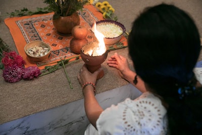 The opening session event incorporated traditional performances and Mayan rituals such as burning candles and offerings.