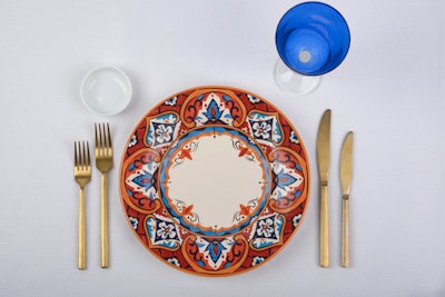 DC Rental recently introduced a colorful new place setting with its 11-inch Valencia base plate, priced at $4 each. The Valencia base plate pairs well with the company’s matte gold flatware ($1.50 each) and its cobalt blue Lido water glass ($2 each). The rental company’s new linens in shades of hot pink, yellow, and turquoise are available in tablecloth rounds of 126 inches for $40 each. DC Rental is centrally located, with a showroom in Arlington, Virginia.