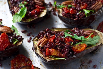 Eggplant stuffed with wild rice, sundried tomatoes, pecans, and arugula, by Elegant Affairs in New York