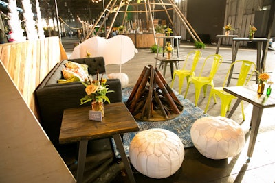Blueprint Studios' lounge was highlighted by a campfire-inspired coffee table and flowers from Scarlett & Grace.