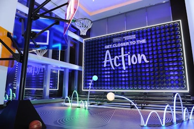 The sports area also included a wall created with basketballs and neon lighting fixtures that provided the illusion of bouncing balls.