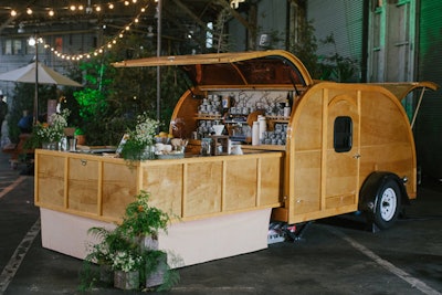 Libations Unlimited served warm drinks such as coffee and hot toddies throughout the evening from a wooden camper.