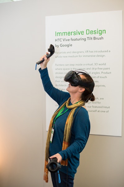 Attendees took part in a virtual-reality demo at the Emerging Tech Showcase.