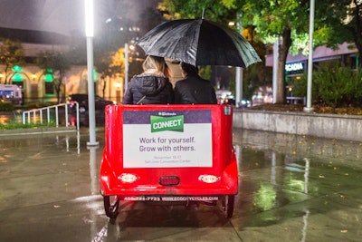 Attendees were offered complimentary rides in pedicabs that featured conference branding.