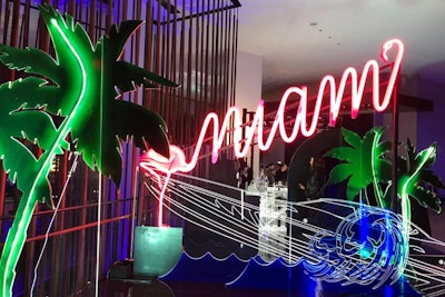 For the travel section of the event, Momentum Worldwide designed three transparent, neon vignettes inspired by cities including Miami. The installations served as photo ops for attendees.