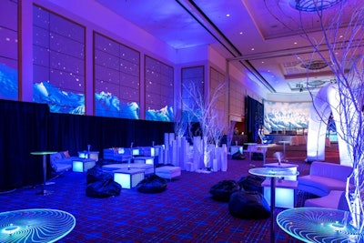 The Aurora Lounge was designed to feel like the “coldest” area of the event. Really Big Video used projection mapping to display the Northern Lights on the walls, and glowing LED tables and pillows added on-theme touches. Heart Beat Silent Disco supplied silent disco headphones.