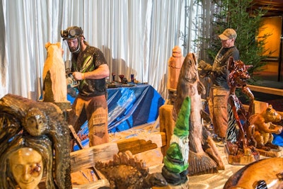 In the Base Camp area, father-and-son team Tyler and Kevin Strauslin of Oregon 3D Art offered live chainsaw carving demonstrations, creating six original pieces during the four-hour event. A finished piece was presented to Comcast as a thank-you.