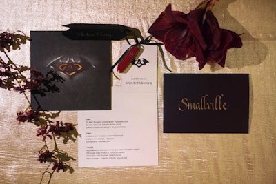 Yonder Design created a custom logo that featured an A to represent the client’s name. The graphics adorned all paper goods, from the invites to the menus to the place cards and napkins.